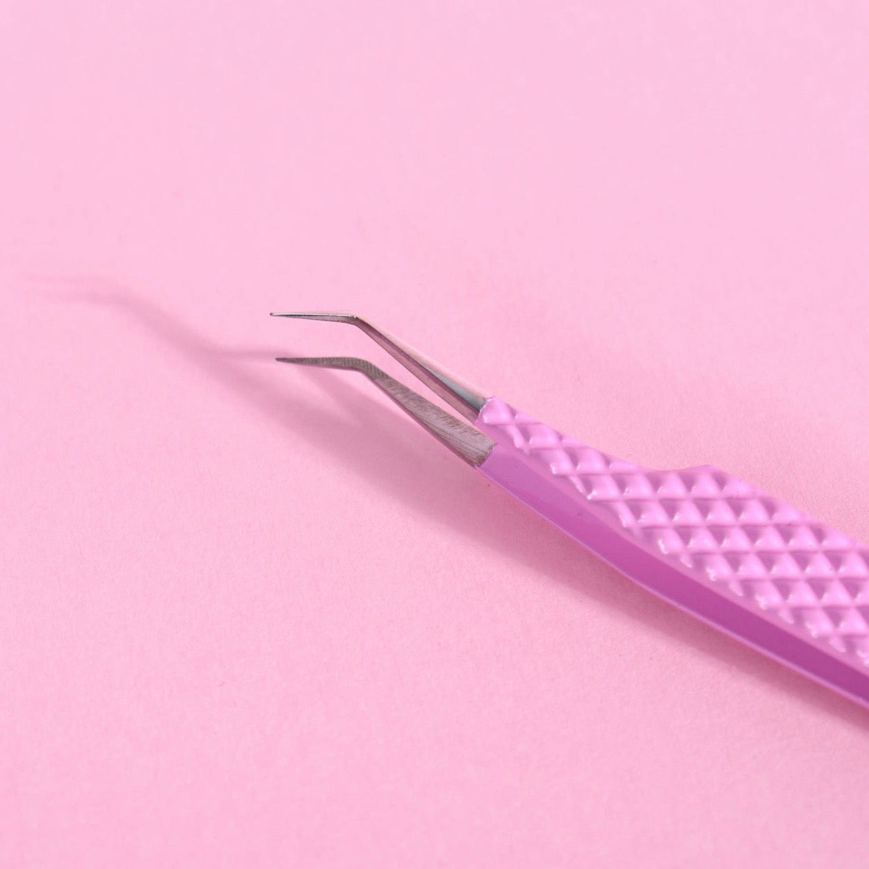 Straight isolation pink tweezer